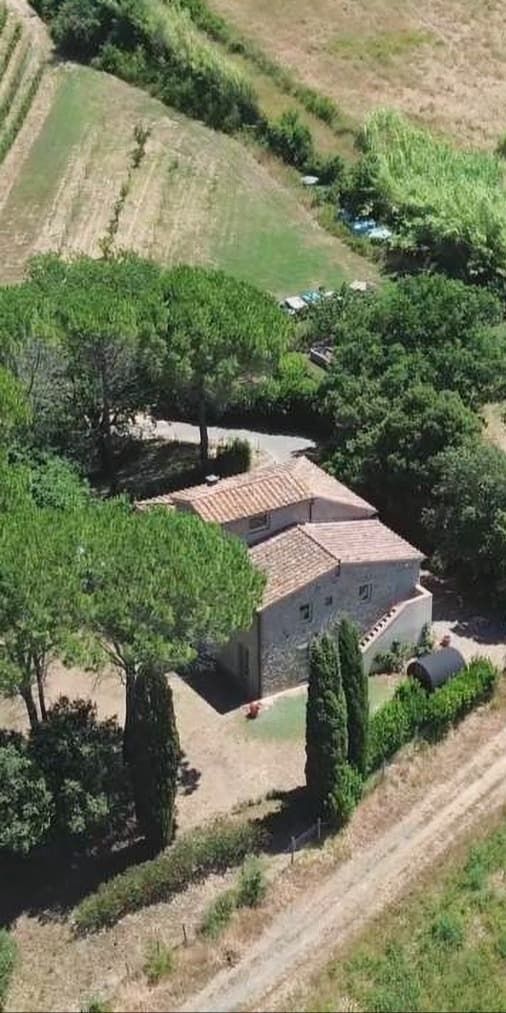 AZ413 Organic winery with a renovated farmhouse, wine cellar, gazebo with wood-fired oven, and land.