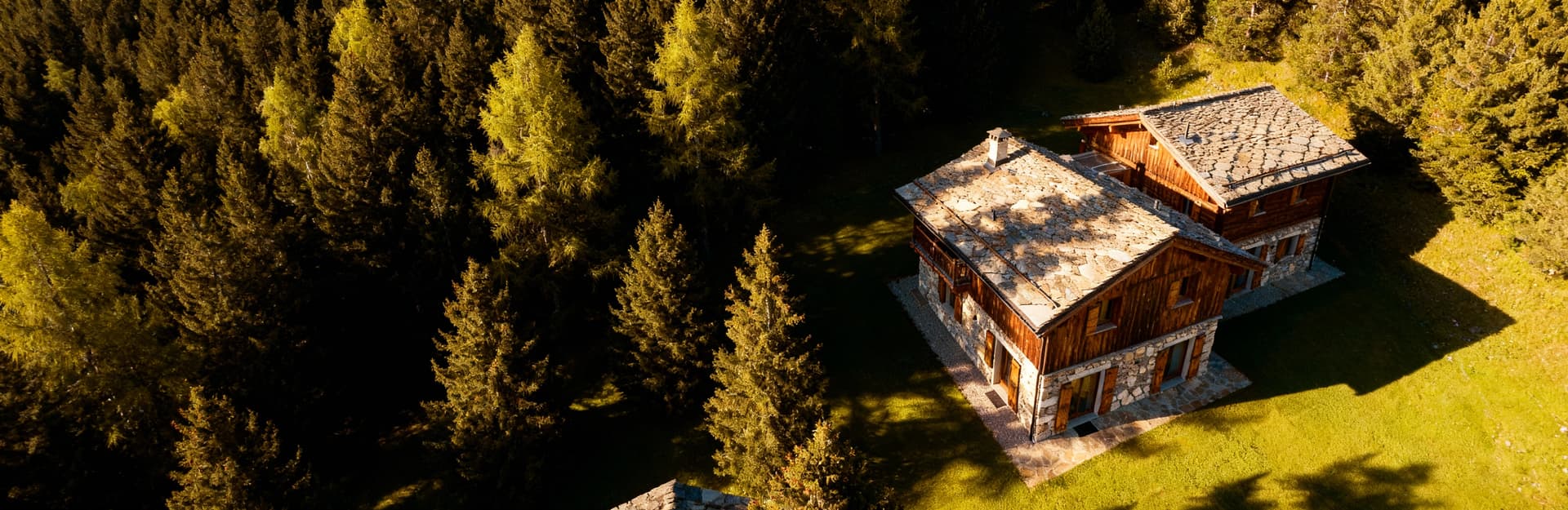 Luxury villas for sale in Belluno province, surrounded by stunning Alpine vistas and pristine nature in the Dolomites.