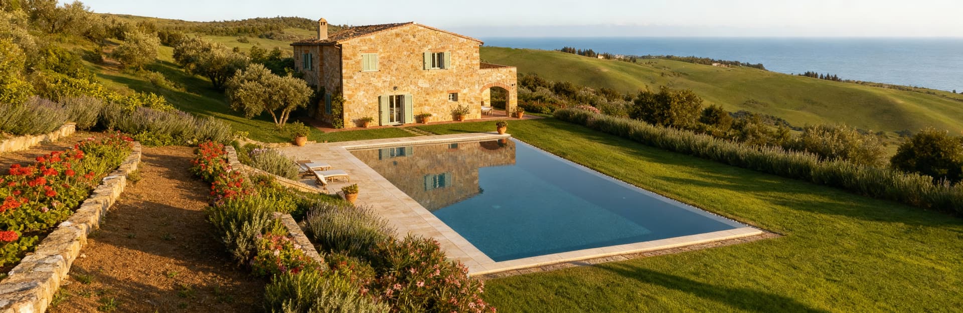 Stunning villas for sale in Grosseto, surrounded by beautiful hills and near the sea, showcasing Tuscany's charm and luxury living.