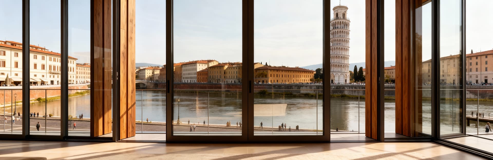 City properties for sale in Pisa province, showcasing the historic Leaning Tower and vibrant university atmosphere by the riverside.