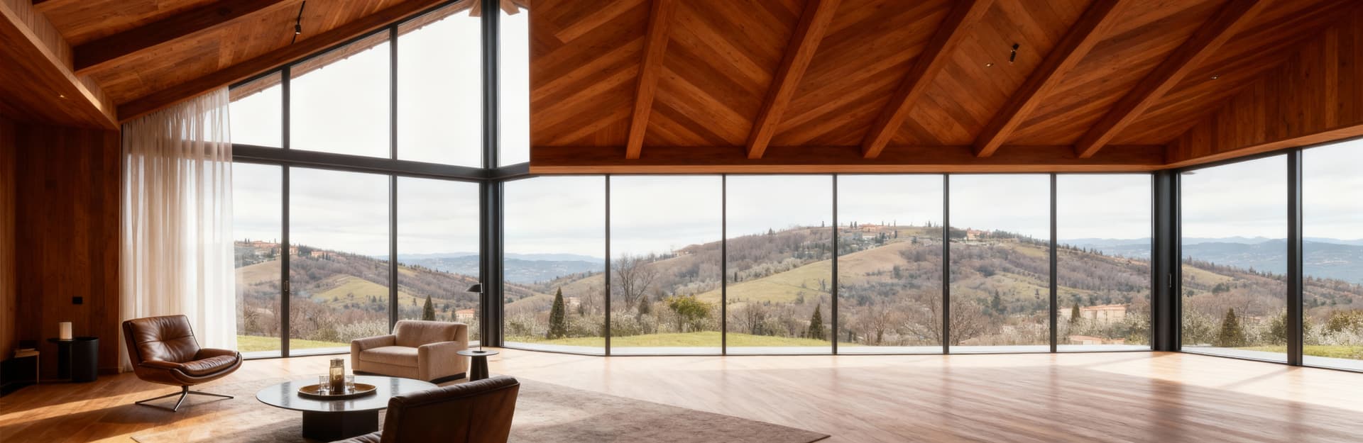 Rustico in vendita all'Argentario: attico moderno con vetrate che mostrano colline di Arezzo, interni eleganti e dettagli in legno.