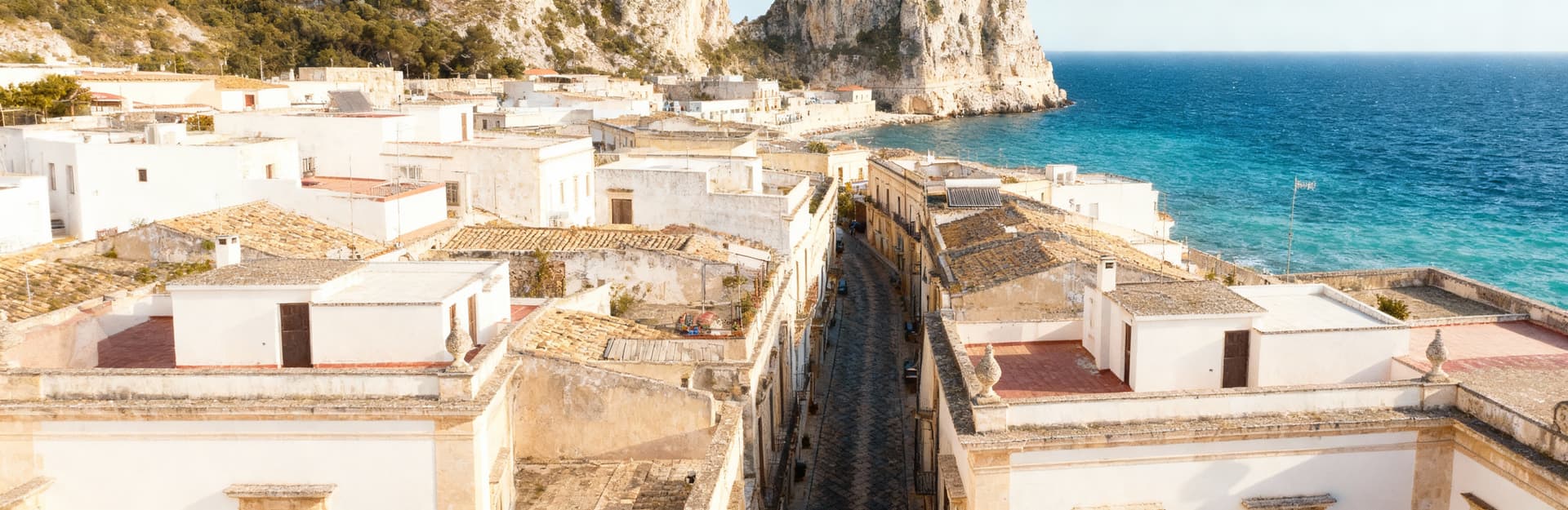 Luxury properties for sale in Syracuse, Sicily, showcasing stunning historical architecture and breathtaking coastal views.