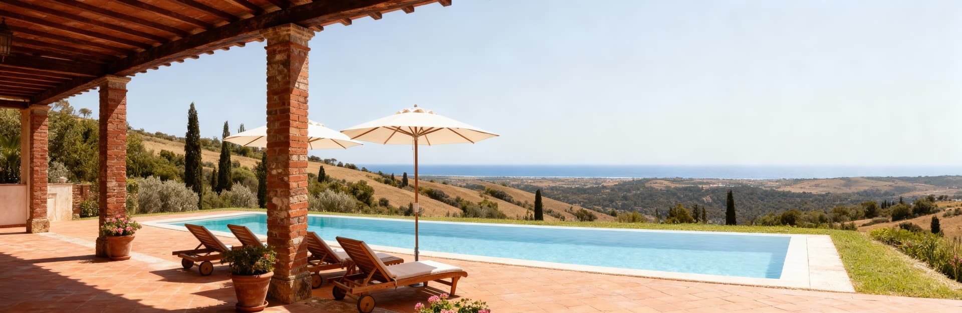 Rustic homes for sale in Livorno's countryside, showcasing Tuscan architecture amidst vineyards and serene landscapes.