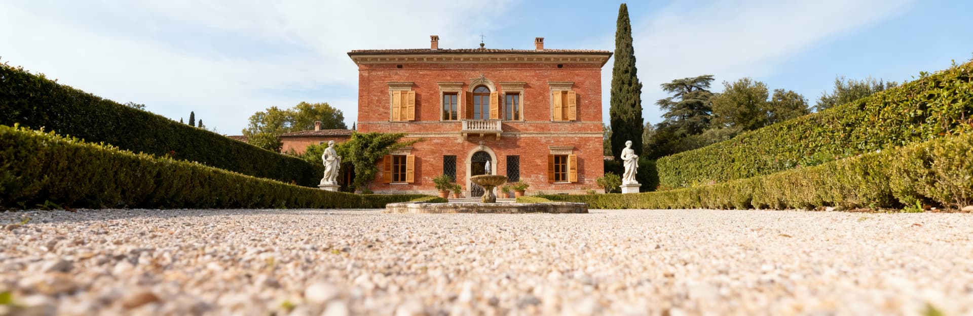 Rustic country homes for sale in Lucca's mountainous region, surrounded by olive groves and stunning landscapes.