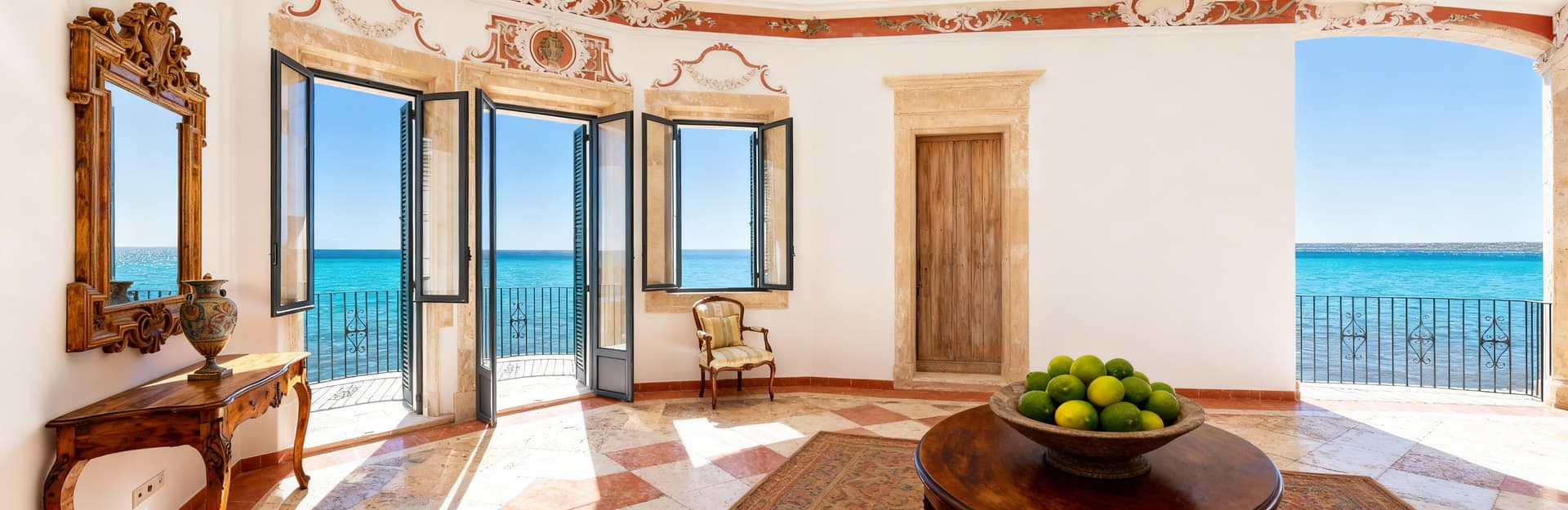 Luxury apartments for sale in Syracuse, Sicily, featuring stunning sea views and historic architecture in a vibrant coastal setting.