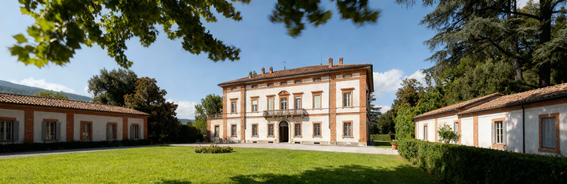 Charming rustic homes for sale in the picturesque countryside of Turin, Piedmont, surrounded by hills and vineyards.