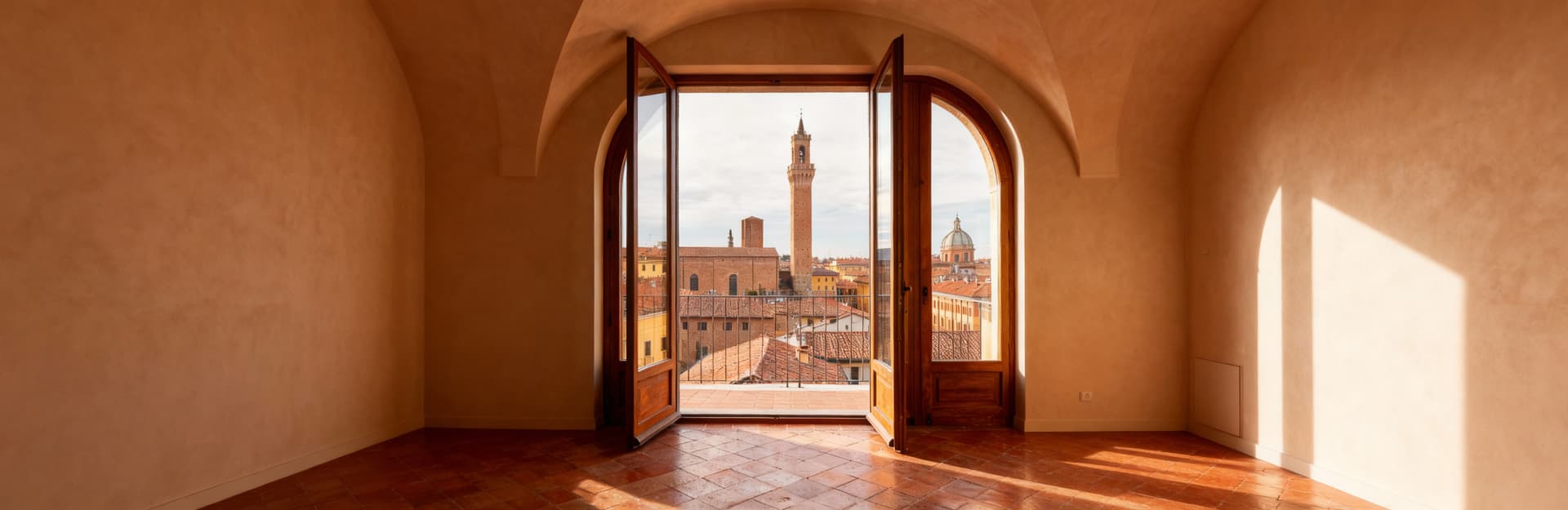 Luxury properties for sale in Bologna, showcasing elegant villas and stylish penthouses in a rich historical setting.