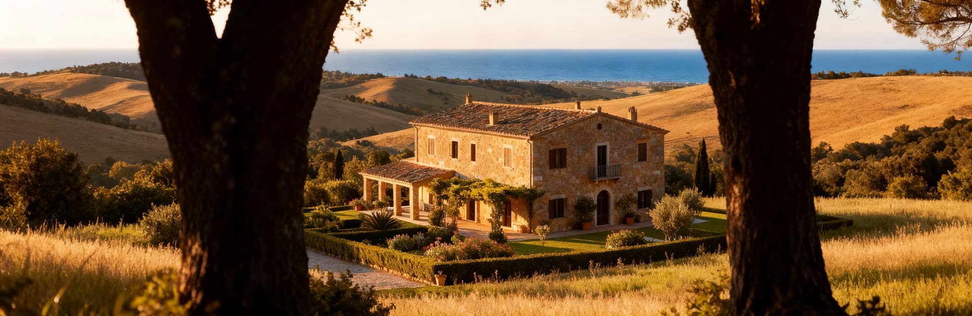 Luxury villas and historic buildings for sale in Grosseto, overlooking the stunning Tuscan coastline and Mediterranean sea.