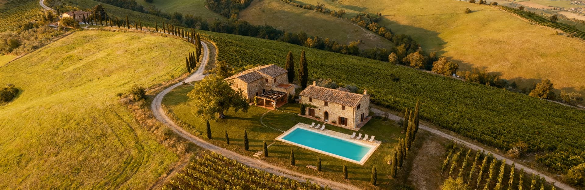 Farmhouses for sale in Lucca's countryside, showcasing historic villas and renovated farmhouses amidst stunning Tuscan landscapes.
