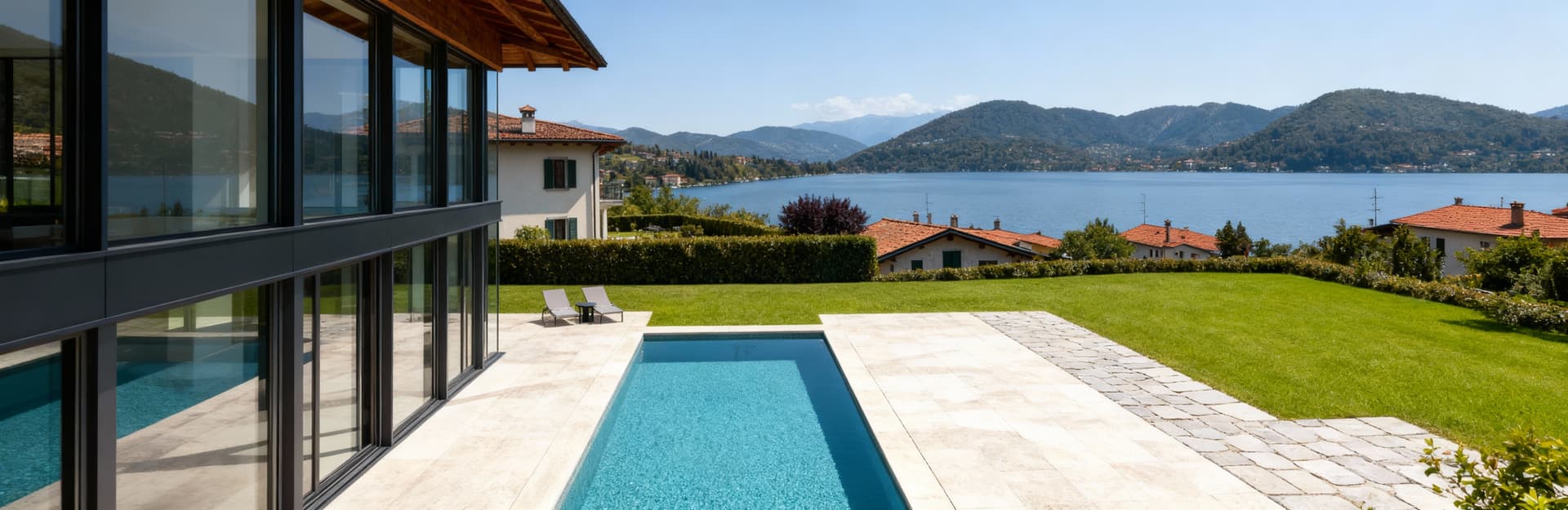 Elegant villas for sale in Lecco, Lombardy, surrounded by stunning lakes and mountains, showcasing architectural beauty.
