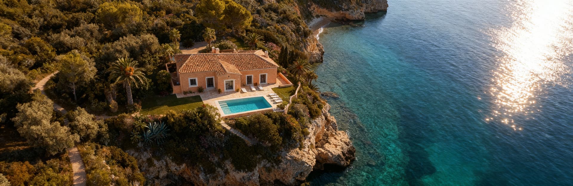 Luxurious villas for sale in Cagliari, Sardinia, showcasing stunning sea views and elegant Mediterranean architecture.