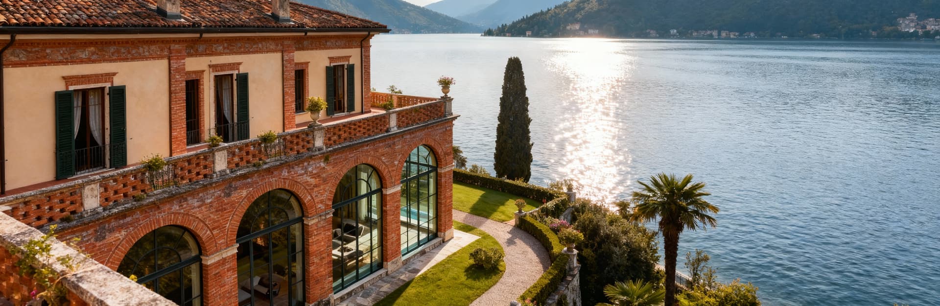 Exclusive villas for sale in Lombardy, surrounded by picturesque lakes and lush hills, embodying luxury and heritage.