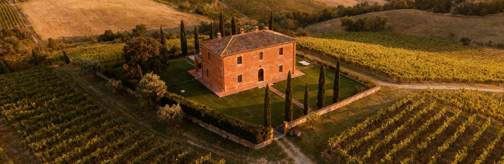 Luxury real estate for sale in Lombardy, showcasing the breathtaking landscapes and historic charm of Val d'Orcia.