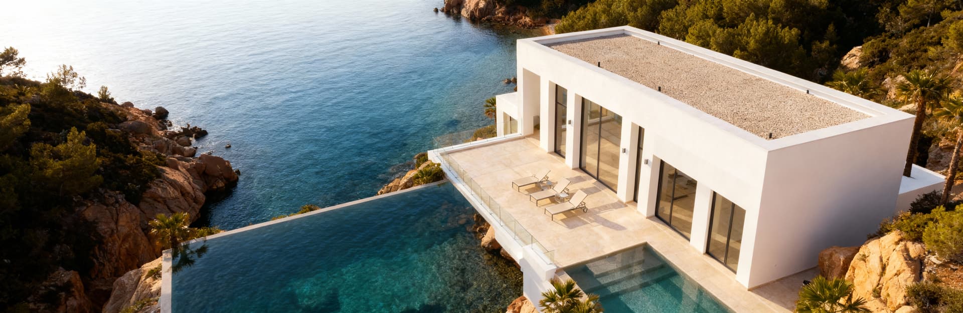 Luxury penthouses for sale in Sardinia offering stunning sea views, spacious terraces, and elegant living spaces.
