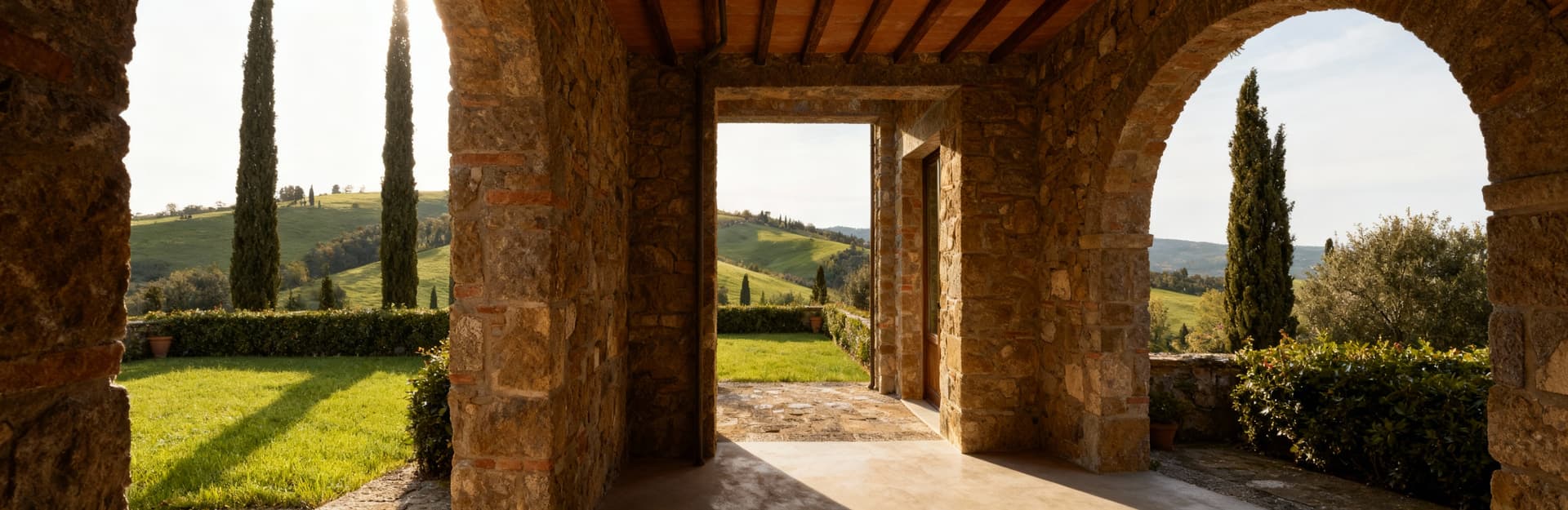 Semi-detached houses for sale in Florence, showcasing Tuscan tradition with stone details and private courtyards amidst scenic hills.