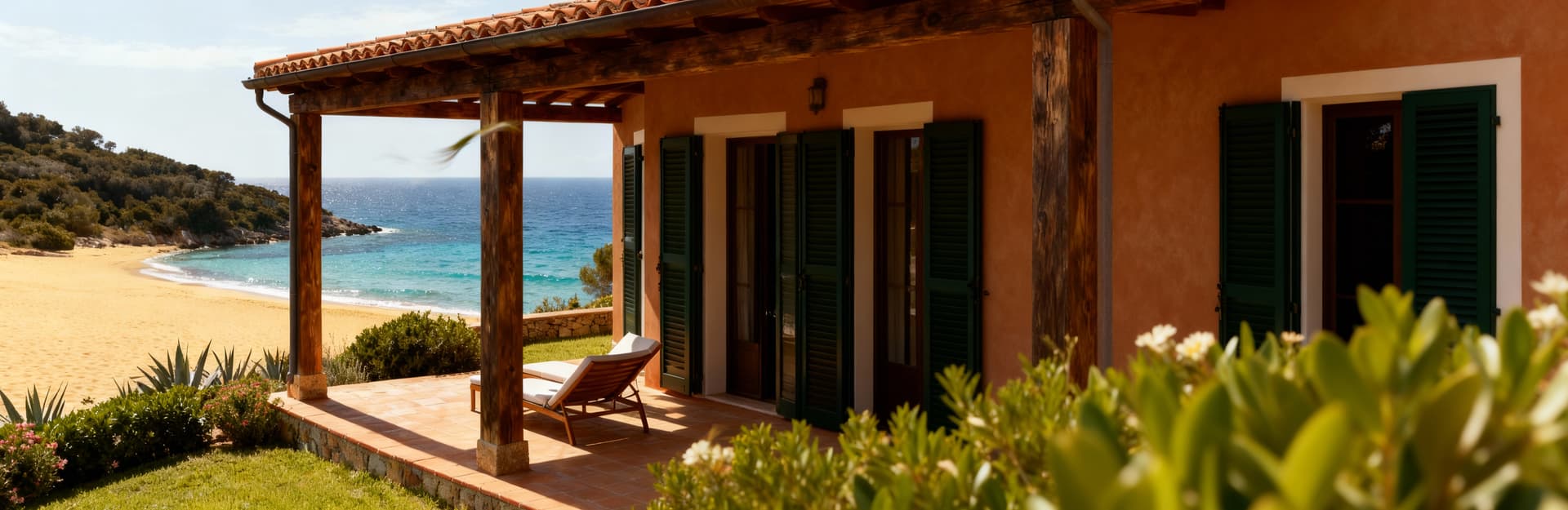 Appartamenti in villa in vendita all'Isola d'Elba, affacciati su spiagge dorate e mare cristallino, realizzati con materiali locali.