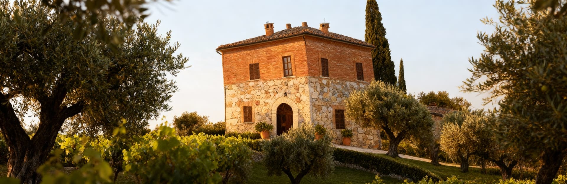 Luxury properties for sale in the countryside of Ascoli Piceno, showcasing elegant villas and restored farmhouses amidst rolling hills.