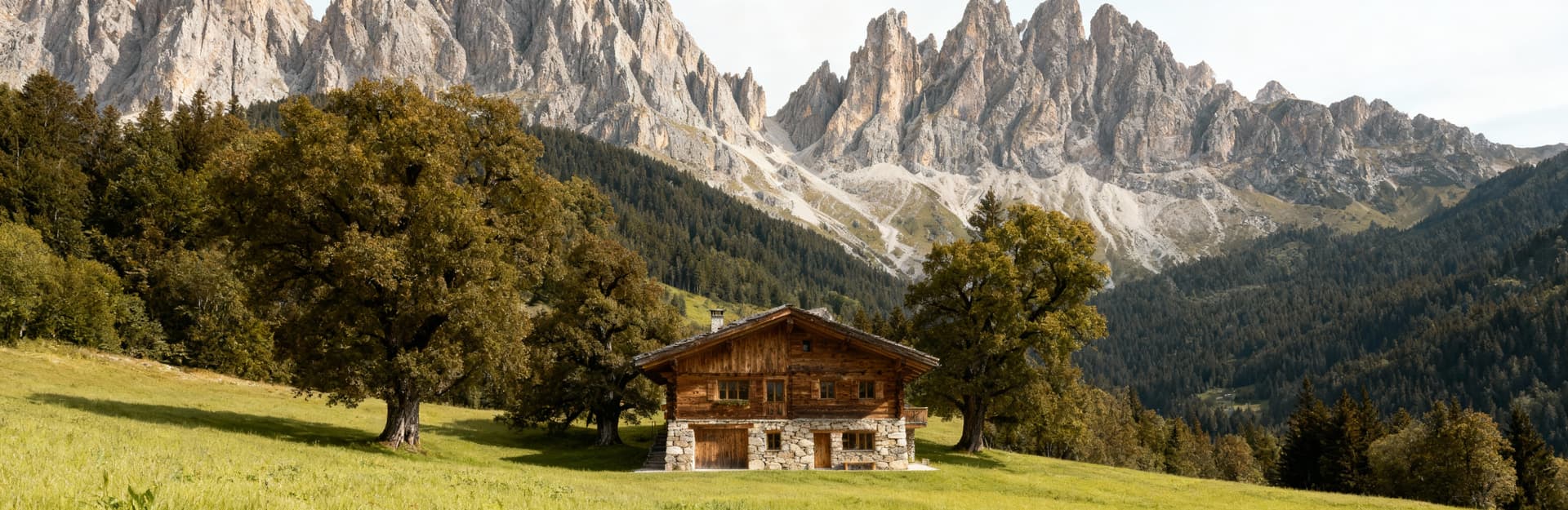 Prestigious rustic homes for sale in Trentino-Alto-Adige, nestled among the stunning Dolomite mountains, offering luxury and privacy.