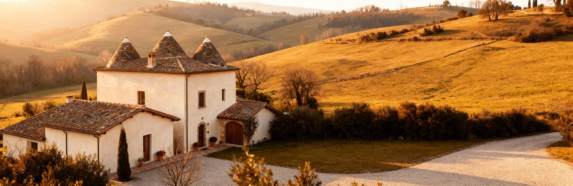 Charming countryside villas for sale in Forlì Cesena, featuring lush gardens and elegant spaces amid green hills and vineyards.