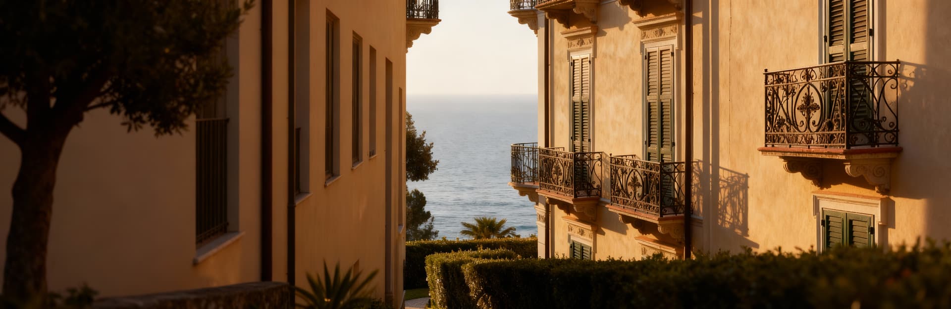 Elegant villa apartments for sale in Genoa's seaside area, featuring scenic views, green spaces, and direct beach access.