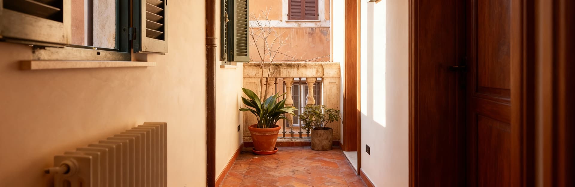 Charming townhouses for sale in Rome's historic neighborhoods, featuring stylish interiors and versatile living spaces.