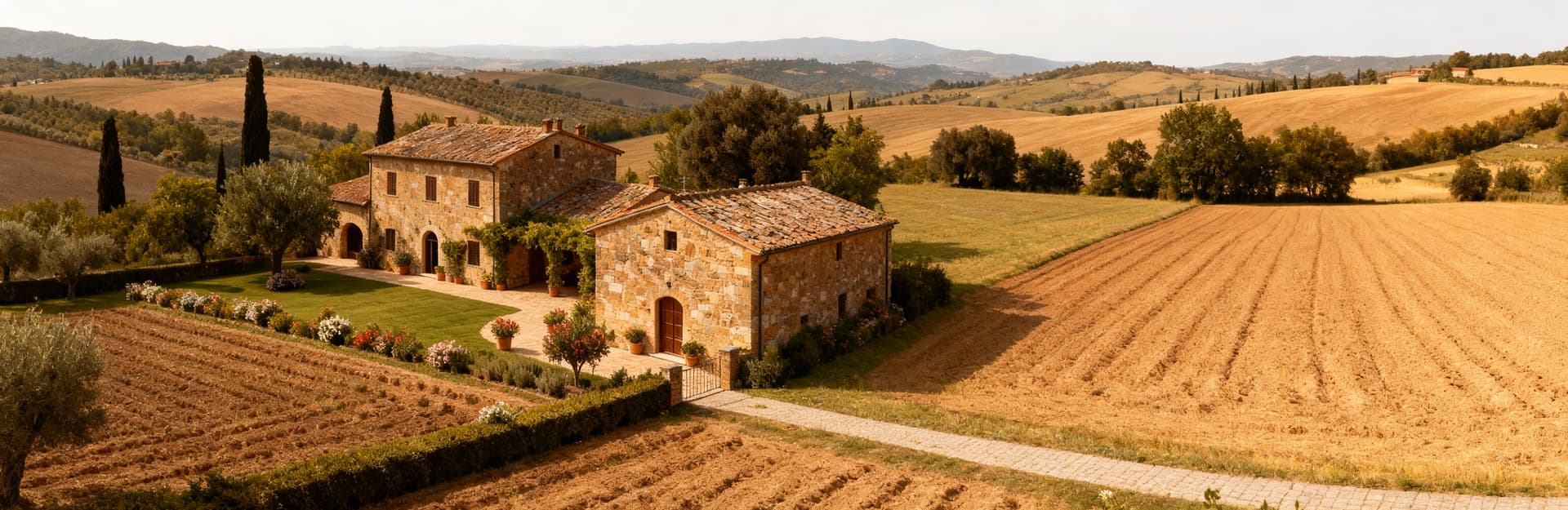 Luxurious estates and complexes for sale in the Tuscan countryside near Florence, featuring expansive farms and rustic villas.