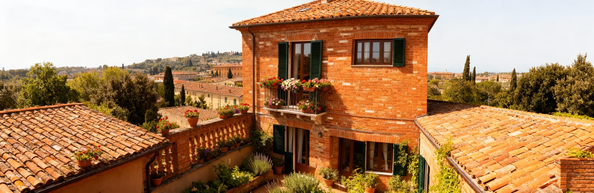 Charming multi-level townhouses for sale in Siena city, featuring historic details and inner gardens, ideal for families.