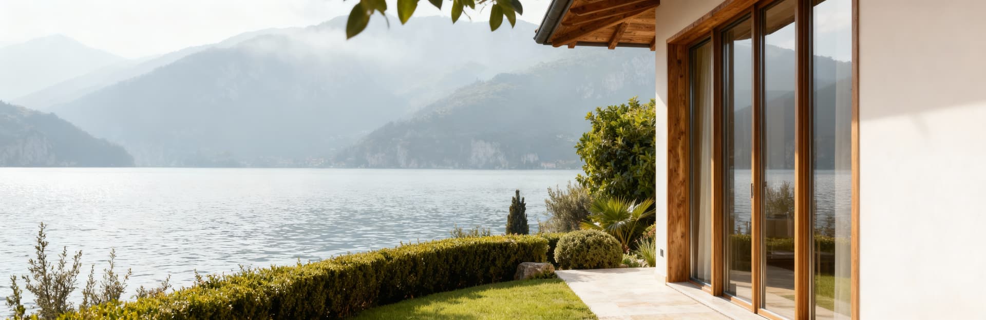 Semi-detached apartments for sale at Lake Garda, featuring cozy spaces and private gardens near the lakeside.