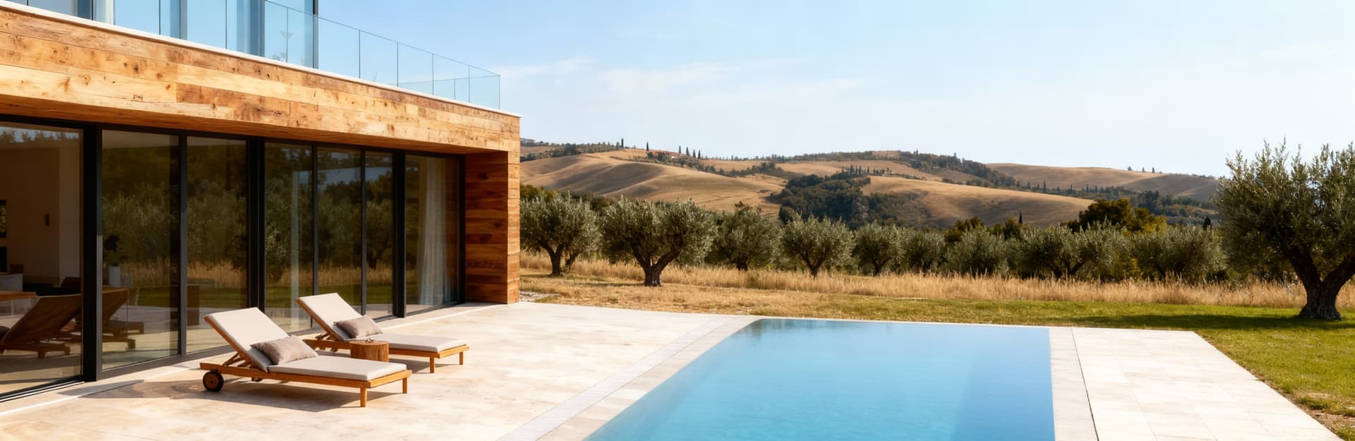 Stunning villas for sale in Veneto at Lake Garda, featuring lush landscapes, pools, and historic architecture in a serene setting.