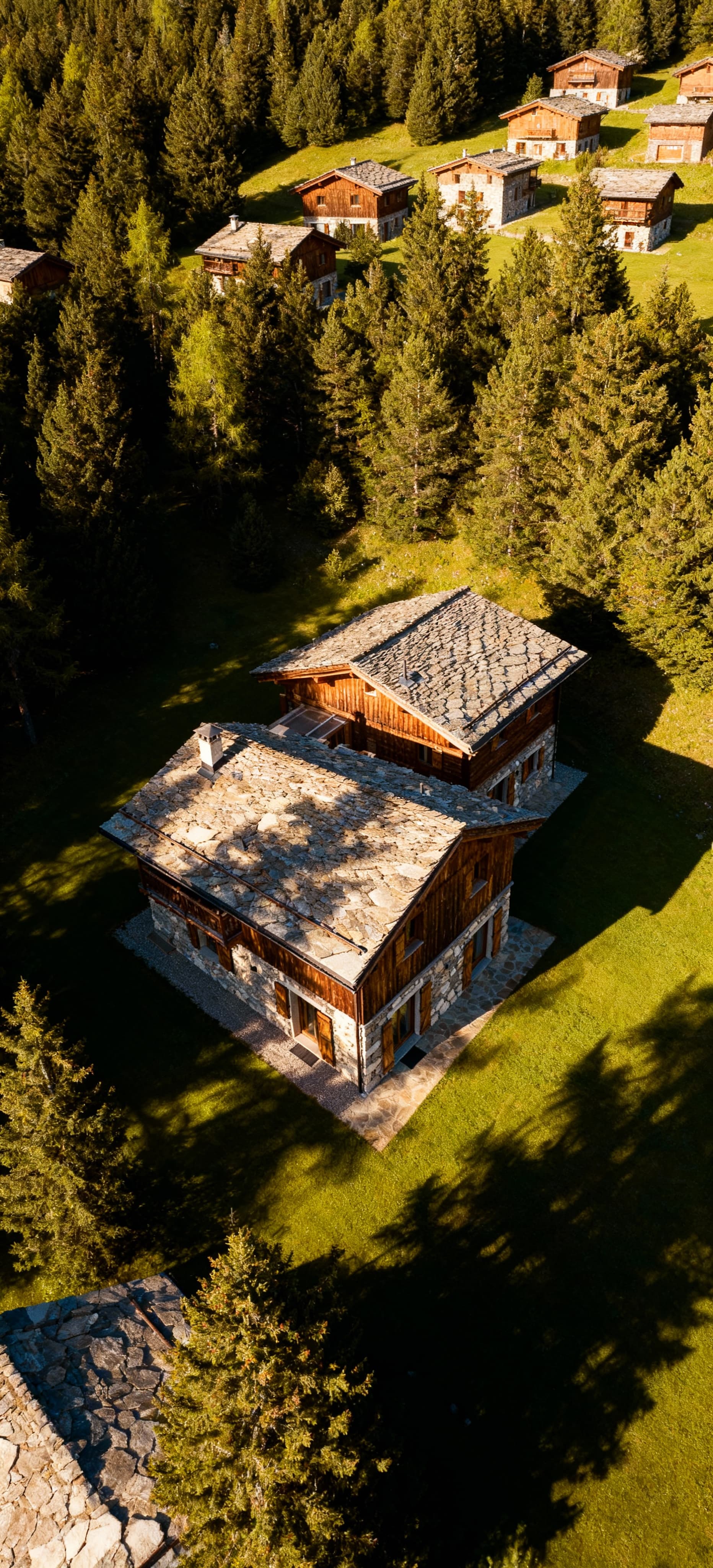 Luxury villas for sale in Belluno province, surrounded by stunning Alpine vistas and pristine nature in the Dolomites.