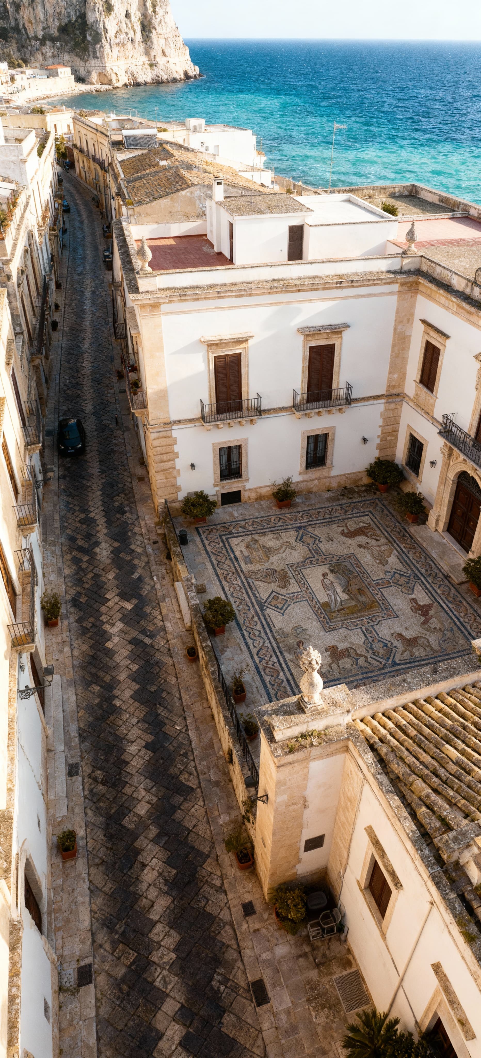 Luxury properties for sale in Syracuse, Sicily, showcasing stunning historical architecture and breathtaking coastal views.
