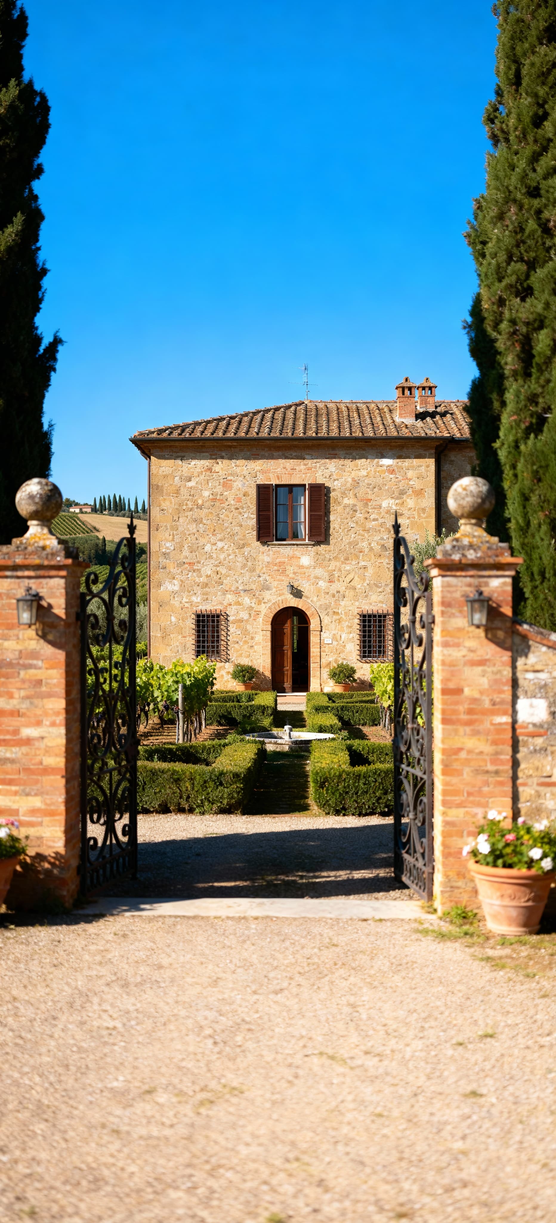 Terraced houses for sale in Siena's Campagna, surrounded by vineyards and historic charm, blending nature and culture.