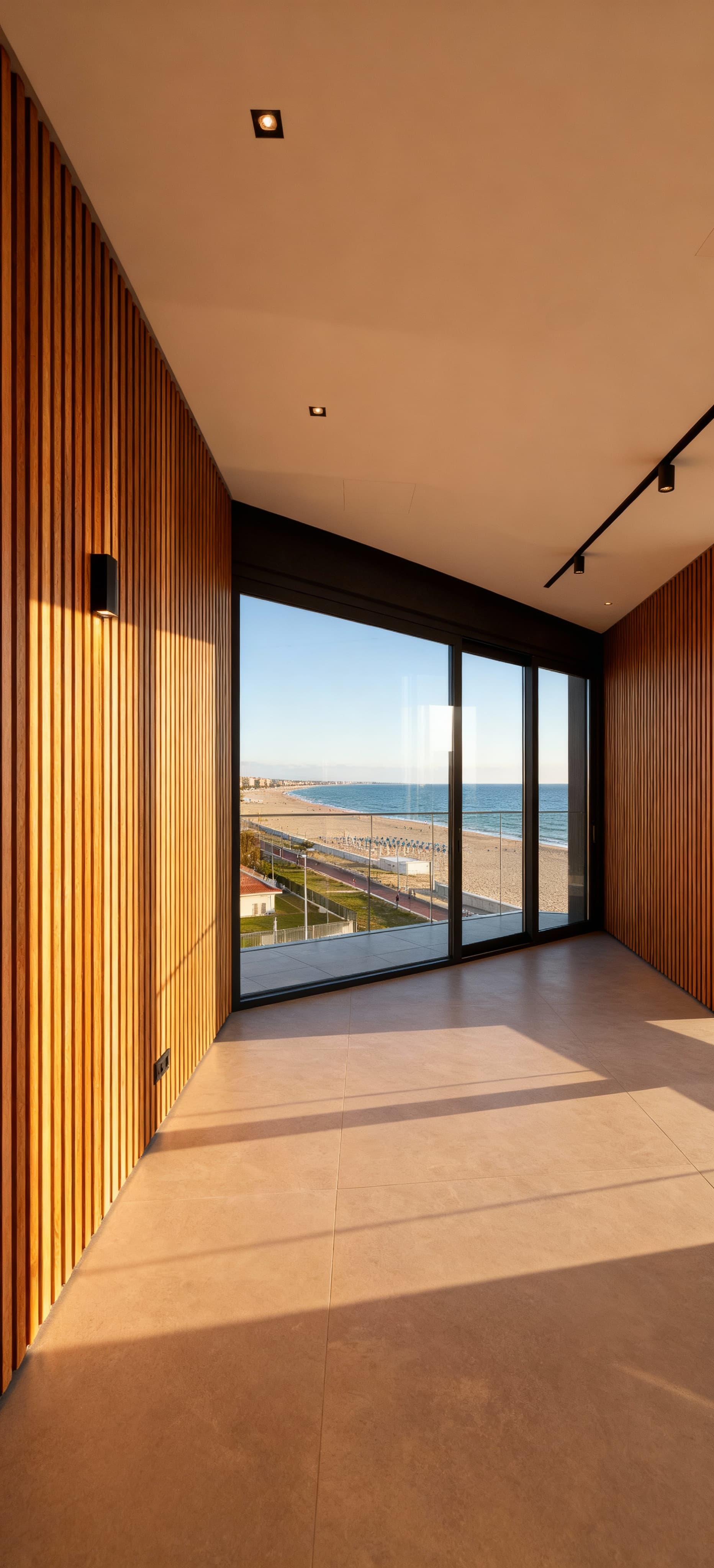 Attico di lusso in vendita a Pescara, design contemporaneo con vetrate sul mare, dettagli eleganti e luce mattutina vivace.