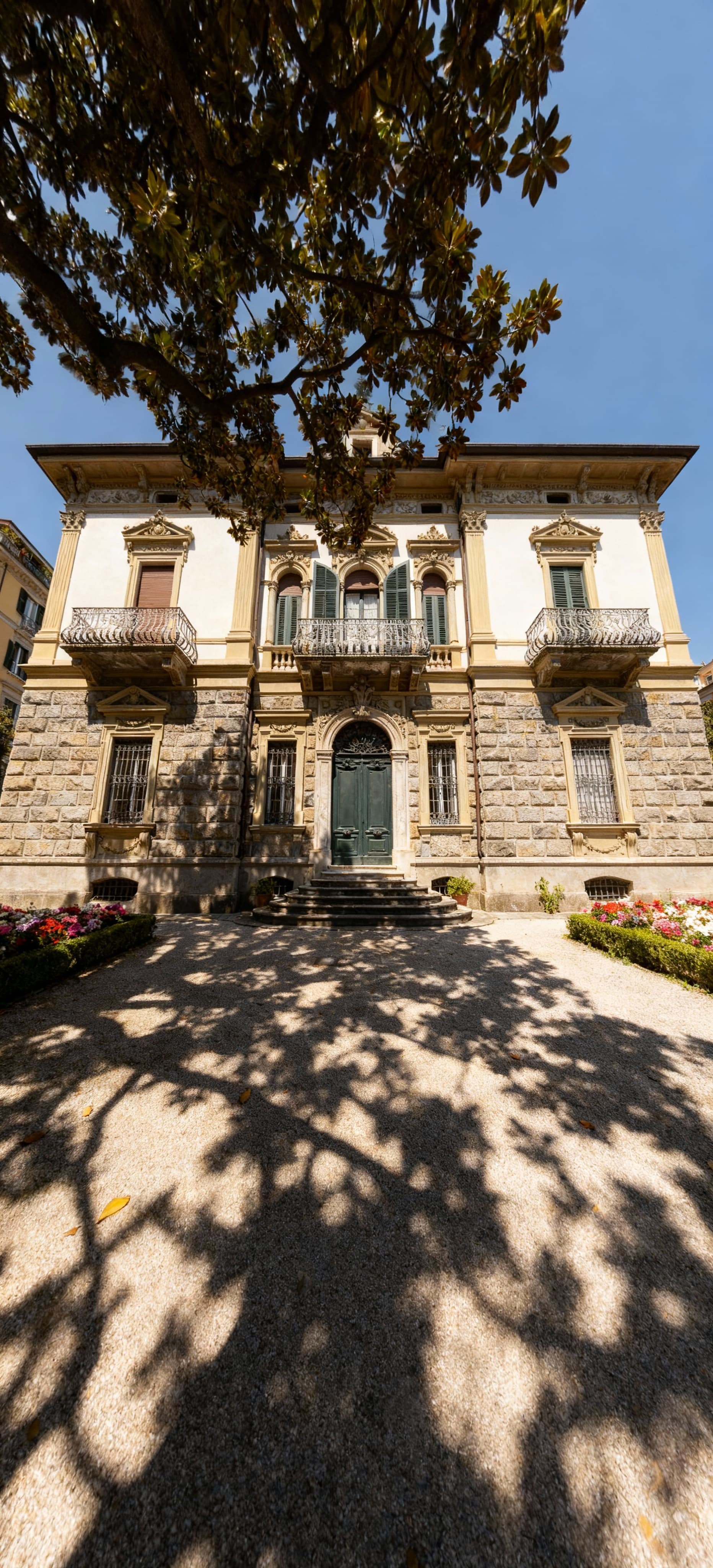 Stunning view of Genoa, Liguria, showcasing seaside apartments for sale near the picturesque Mediterranean coastline.