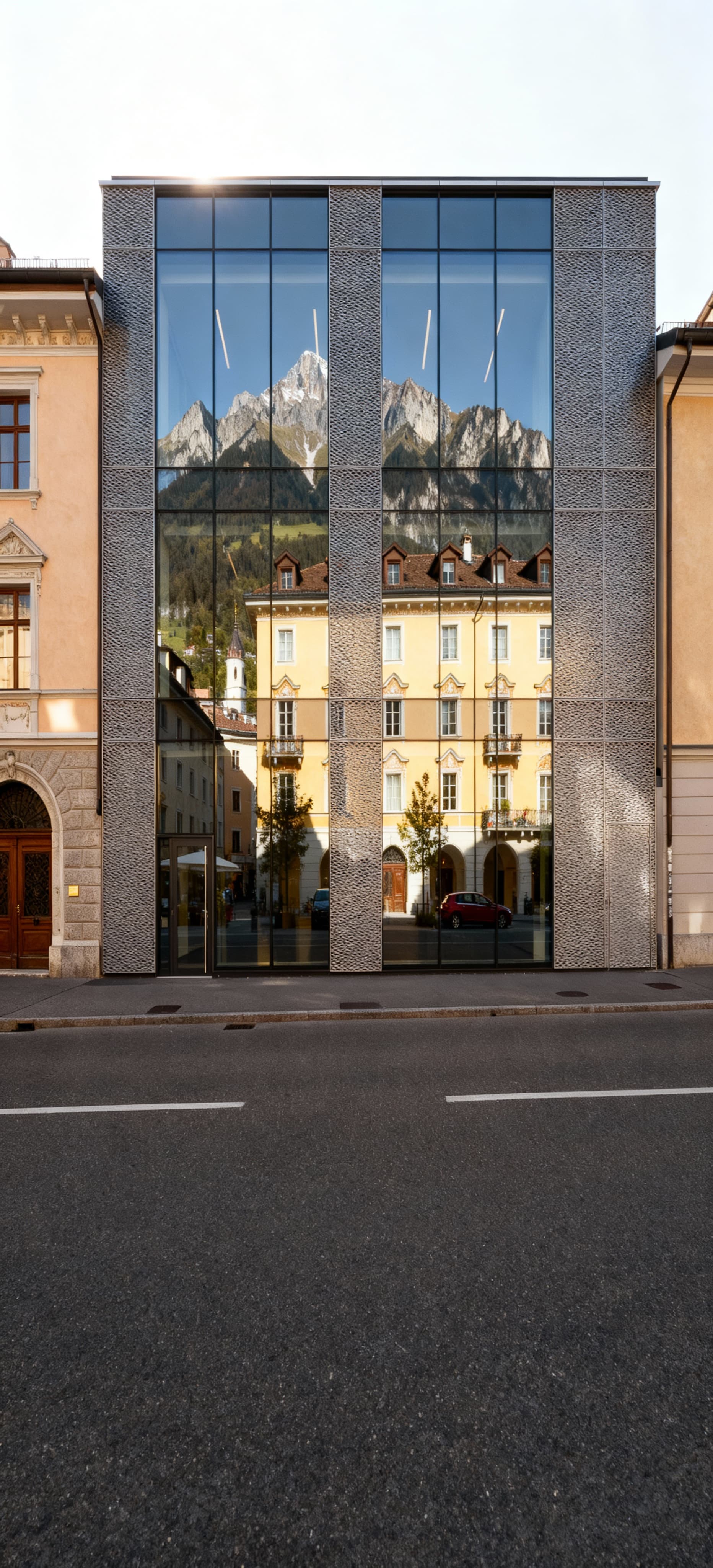 Office spaces for sale in Bolzano, Trentino-Alto Adige, showcasing stunning Alpine views and historical architecture.