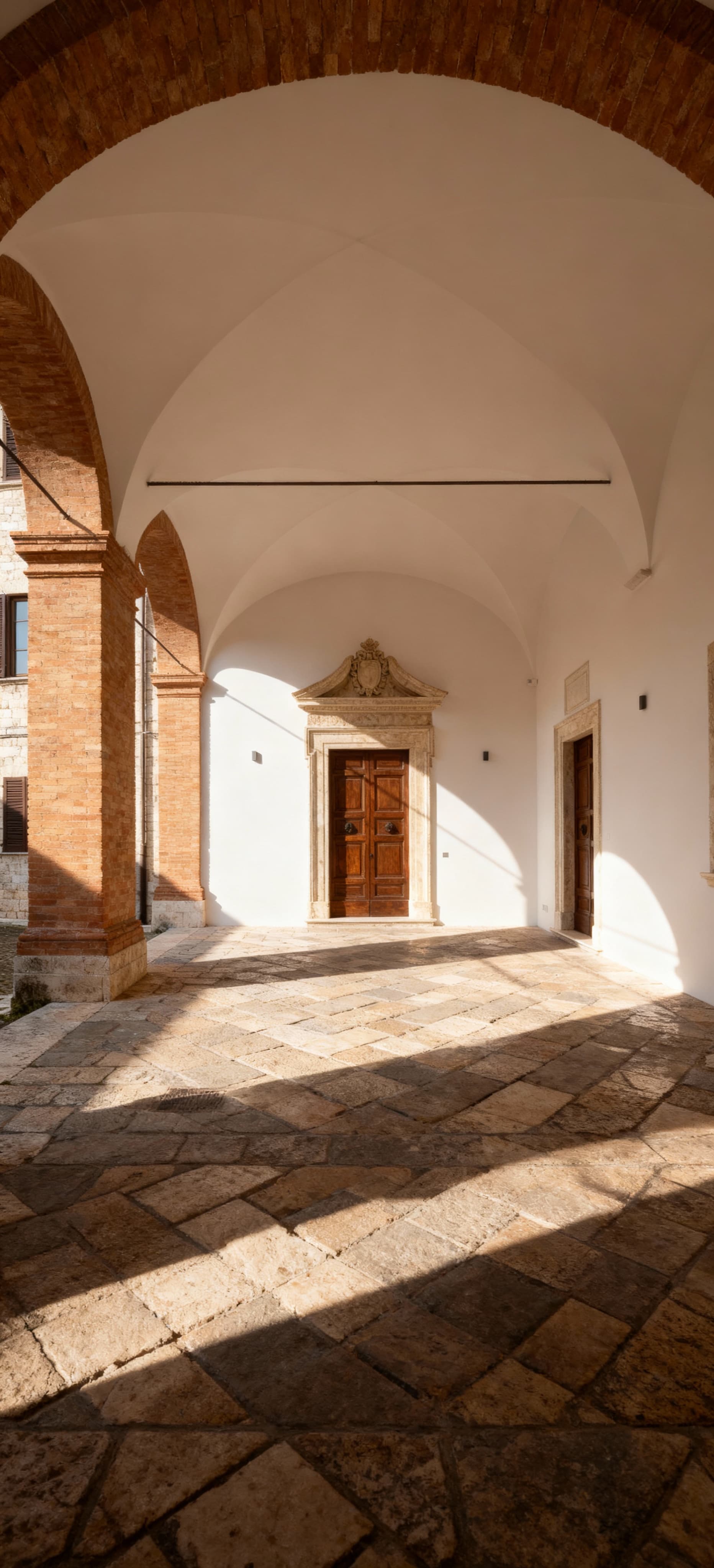 Luxury real estate for sale in Ascoli Piceno's historic center, featuring elegant palaces and modern apartments in a vibrant setting.