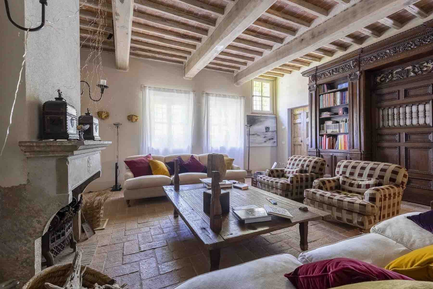 Corsanico, hillside; Finely restored country house with swimming pool and annex.
